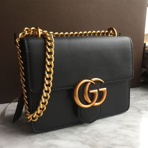 gucci black bag gold chain